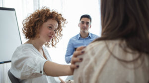 a group of people talk at a dialectical behavior therapy program in ca or dbt