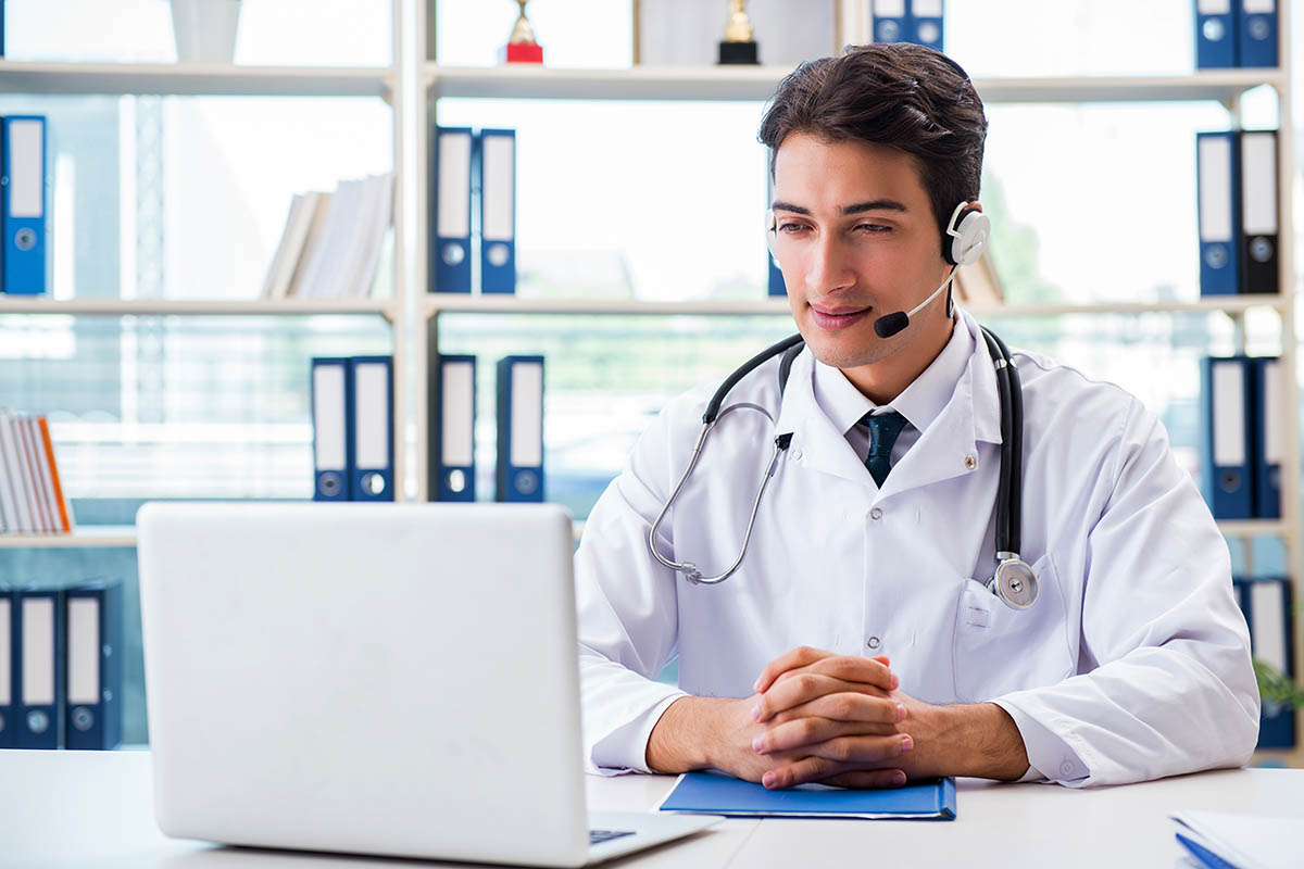 Young male doctor in telehealth concept telehealth programs