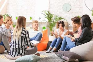 several young adults participate in a group therapy program in northern california