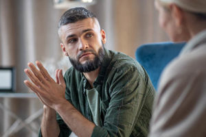 a man debates entering northern california drug and alcohol detox programs