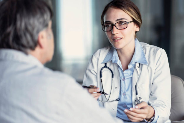 a doctor discusses how to detox from heroin with a patient